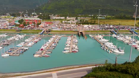 4K-Drone-Video-of-Boats-and-Ships-in-Valdez-Commercial-Boat-Harbor-in-Valdez,-AK-during-Sunny-Summer-Day