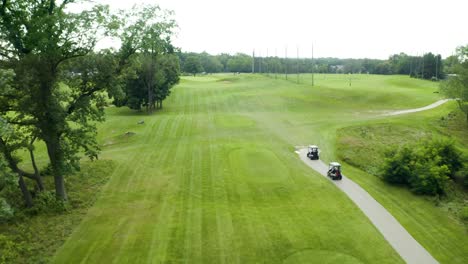 Drone-footage-of-golfer-at-Tee-box-driving
