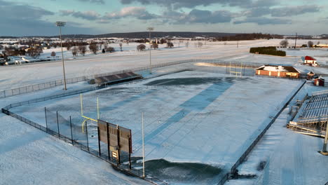 Football-field-school-campus-in-winter-snow