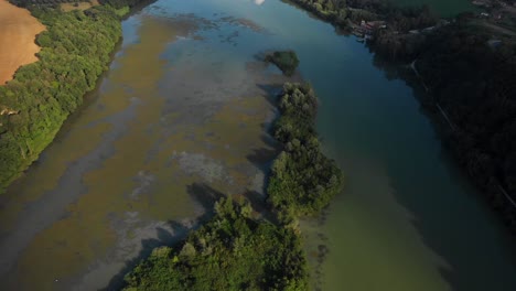 Aerial-footage-of-beautiful-sunrise-over-the-Tiber-river,-north-of-Rome,-the-top-view-of-the-Tiber-river