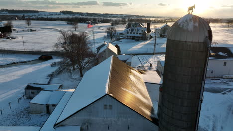 Family-farm-in-winter-sunset