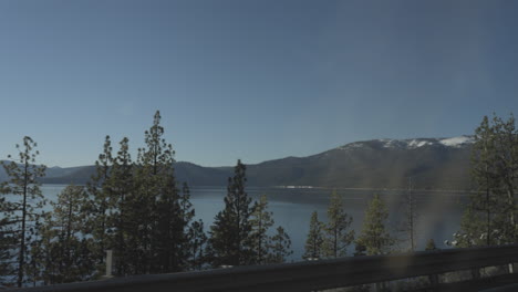 Passenger-side-view-out-the-window-at-Lake-Tahoe-passing-by