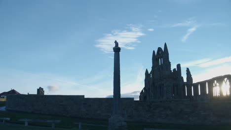 Whitby-Abbey,-North-York-Moors,-Pan-right-Shot,-early-morning-sunshine-North-Yorkshire-Heritage-Coast-BMPCC-4K-Prores-422-Clip-6