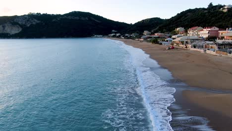 drone-flying-close-to-the-waves-in-agios-georgios-beach-greece