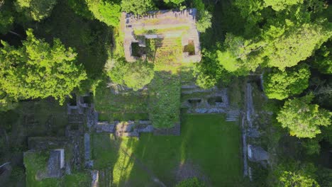 Mayan-Pyramid-Ruin-in-the-jungle-of-Guatemala-coverd-by-trees,-Nakum