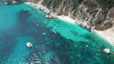 Drone-View-of-a-White-Sand-Beach-in-Sardinia,-Italy