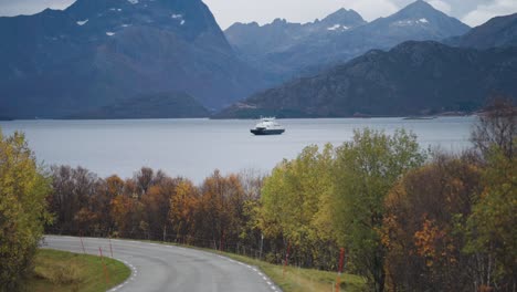 A-narrow-rural-road-follows-the-fjord-coastline