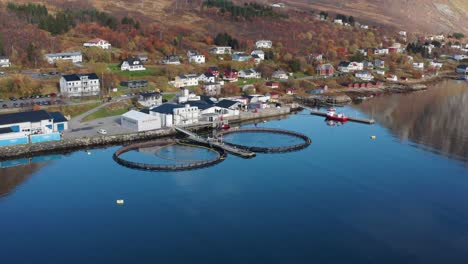 Aerial-view-of-a-small-salmon-farm-in-the-village-of-Torsken
