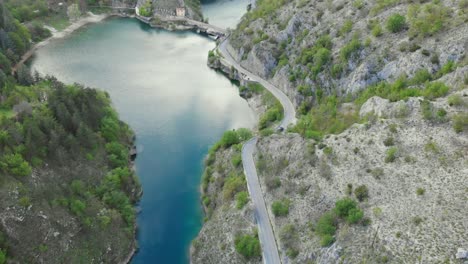 Aerial-shot-of-beautiful-Lago-di-San-Domenico-Lake-in-the-Province-of-L'Aquila,-Abruzzo-ITALY