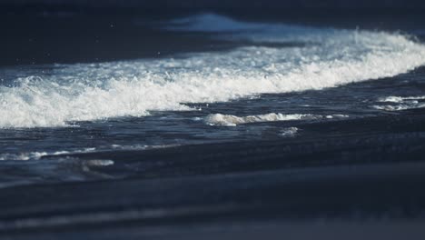 Powerful-waves-break-around-the-sandy-beach-in-Ersfjord