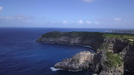 Aerial-view-of-tall-eroded-and-rugged-sea-cliffs