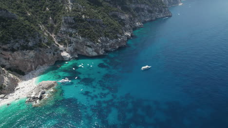 Aerial-drone-video-of-tropical-paradise-sea-in-the-mediterranean,-Sardinia,-Costa-Azzurra