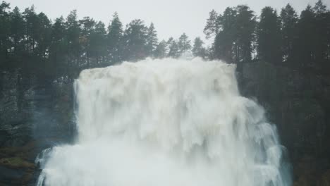 A-raging-overflowing-Tvindefossen-waterfall-after-the-heavy-rain