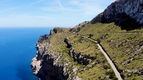 Scenic-road-on-top-of-sheer-limestone-cliff-above-Mediterranean