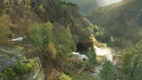 Aerial-view-of-the-Skjervfossen-waterfall-and-surrounding-valley
