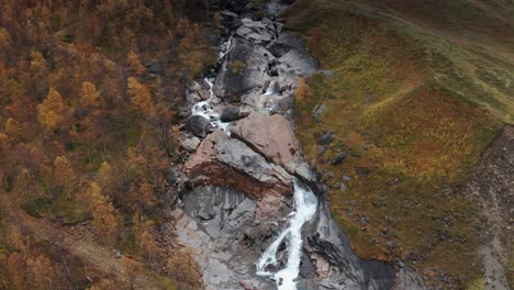 Aerial-view-of-the-wild-river-rushing-through-the-narrow-canyon