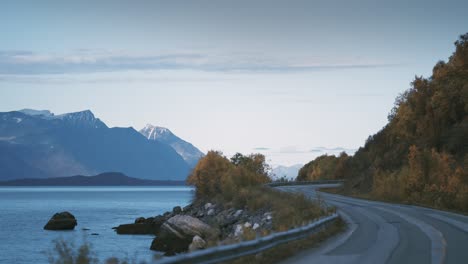 Narrow-asphalt-road-following-the-fjord-shoreline