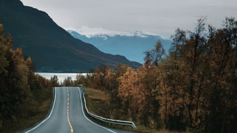 Narrow-two-lane-road-following-the-fjord-shoreline