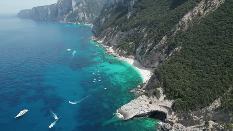 Aerial-drone-video-of-tropical-paradise-turquoise-beach-in-the-mediterranean,-Sardinia,-Costa-Azzurra