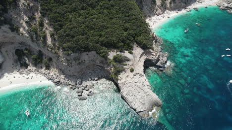 Aerial-drone-video-of-tropical-paradise-turquoise-coast-in-the-mediterranean,-Sardinia,-Costa-Azzurra