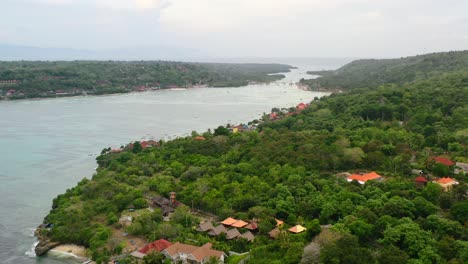 aerial-of-Nusa-Lembongan-and-Ceningan-Island-connected-by-bridge-on-cloudy-day