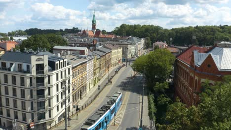 Aerial-View-of-the-Krakow-Fast-Tram-Light-Rail-Driving-through-City