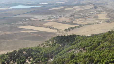 Tilt-down-view-of-desert-area-close-to-Fes-or-Fès-in-Morocco-seen-from-top-of-hill