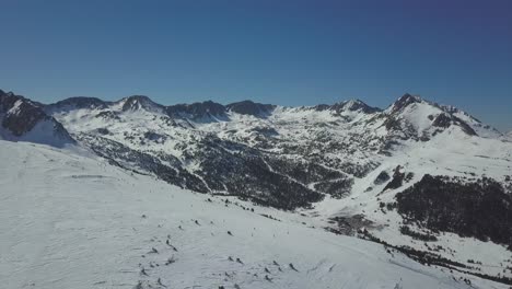 Aerial-tilt-down-shot-of-ski-slopes-in-Grandvalira,-Andorra