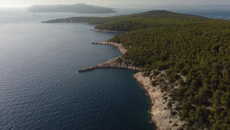 Aerial-orbit-shot-revealing-wild-Croatian-beaches-at-Adriatic-sea,-Brac-island
