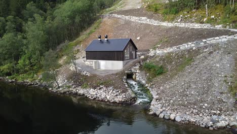 Markani-hydroelectric-powerplant-in-Vaksdal-Norway---Rotating-close-aerial-of-small-local-powerplant---10GWH-yearly-production-and-owned-by-Aventron-and-operated-by-Captiva-Asset-Management