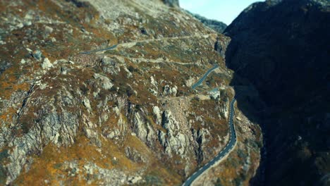 An-aerial-view-of-the-narrow-mountain-road-snaking-through-the-plateau