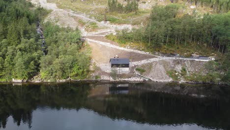 Distant-aerial-view-showing-Markani-hydroelectric-powerplant-in-Vaksdal-Norway---10GWH-yearly-production-and-owned-by-Aventron-and-operated-by-Captiva-Asset-Management
