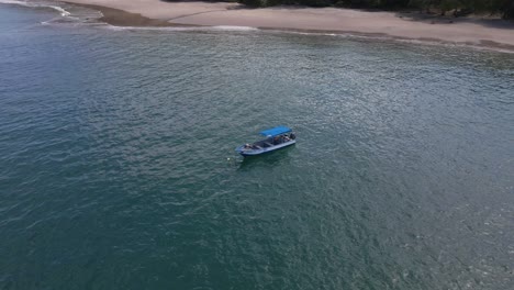 Rotating-Aerial-Shot-Of-A-Static-Fishing-Boat