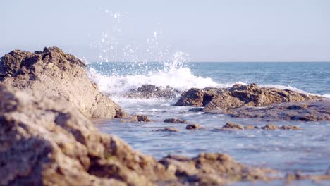 Ocean-waves-in-slow-motion-on-a-rocky-coastline