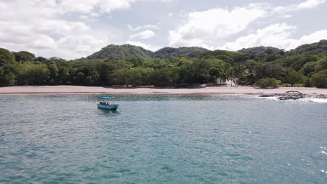 Revealing-Shot-Of-Two-Small-Fishing-Boats-At-The-Coast-Near-The-Playa-Real-Beach-In-Guanacaste-Province