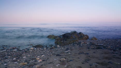Rocky-beach-time-lapse-sunset
