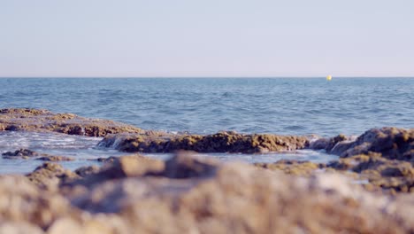 Mediterranean-sea-rocky-shoreline-in-slow-motion