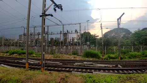 High-voltage-power-station-for-Railways-electricity-high-|-voltage-substation-with-tall-pylons-and-voltage-distribution-cables-of-Railways