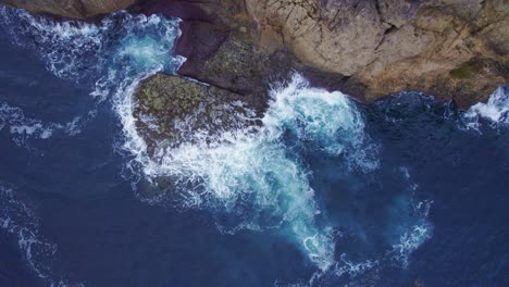 Drone-clip-over-the-cliff-in-Suances,-Spain