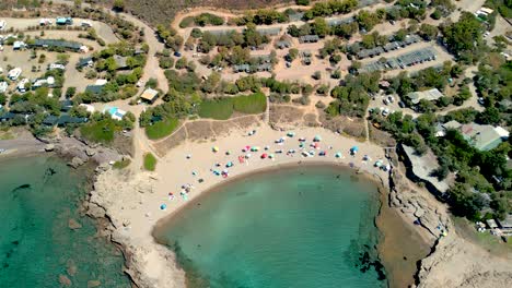 European-tourism-aerial-views-of-a-beach-on-the-island-of-Sardinia-Italy-year-2022-summer