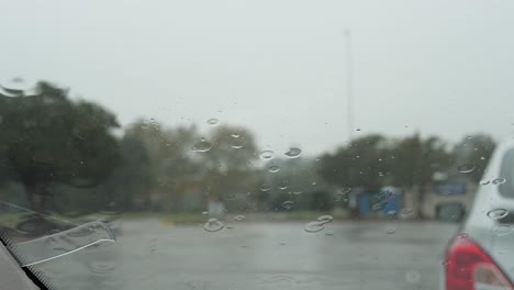 Cinematic-windshield-wiper-wiping-rain-away-in-slow-motion-4K