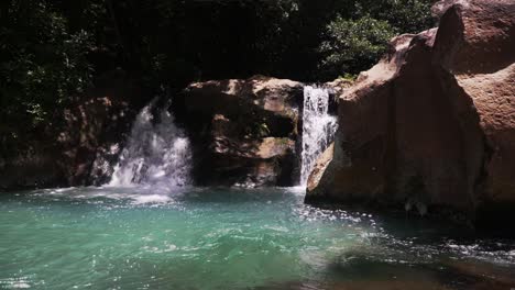 waterfall-in-Costa-Rica-rainforest,-tropical-scenic-seascape-in-the-natural-forest,-Mother-Earth-beauty-footage-in-Las-Chorreras,-Liberia