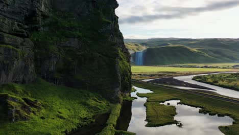 cinematic-reveal-shot-of-a-waterfall-in-iceland