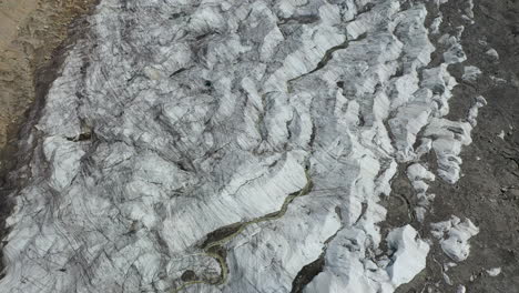 Drone-shot-of-Nanga-Parbat-with-a-glacier,-Fairy-Meadows-Pakistan,-tilting-upward-aerial-shot