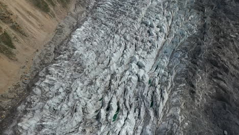 Drone-shot-of-glacier-ice,-Fairy-Meadows-Pakistan,-downward-angle-cinematic-wide-aerial-shot
