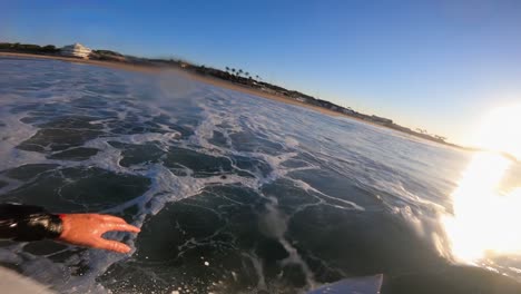Surfer-on-blue-ocean-wave-getting-epic-barrel