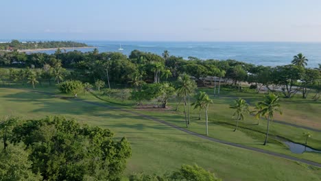 Aerial-orbit-shot-of-Golf-Club-COurt-beside-Playa-Dorada-Beach-in-Puerto-Plata,Dominican-Republic