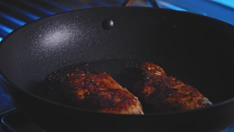 Flipping-Chicken-Breast-Cooking-In-A-Pan