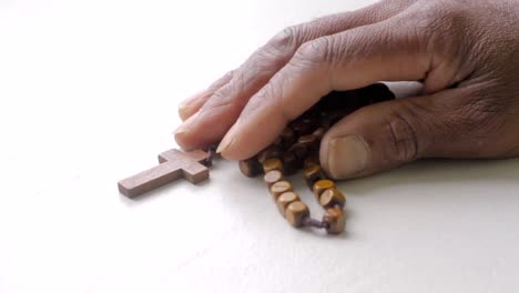 praying-to-god-with-cross-in-hands-together-with-cross-stock-footage