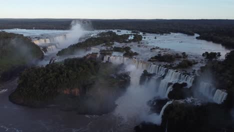 Iguazu-Falls-border-of-Argentina-and-Brazil-at-sunset-in-Amazon-Rainforest---Aerial-view